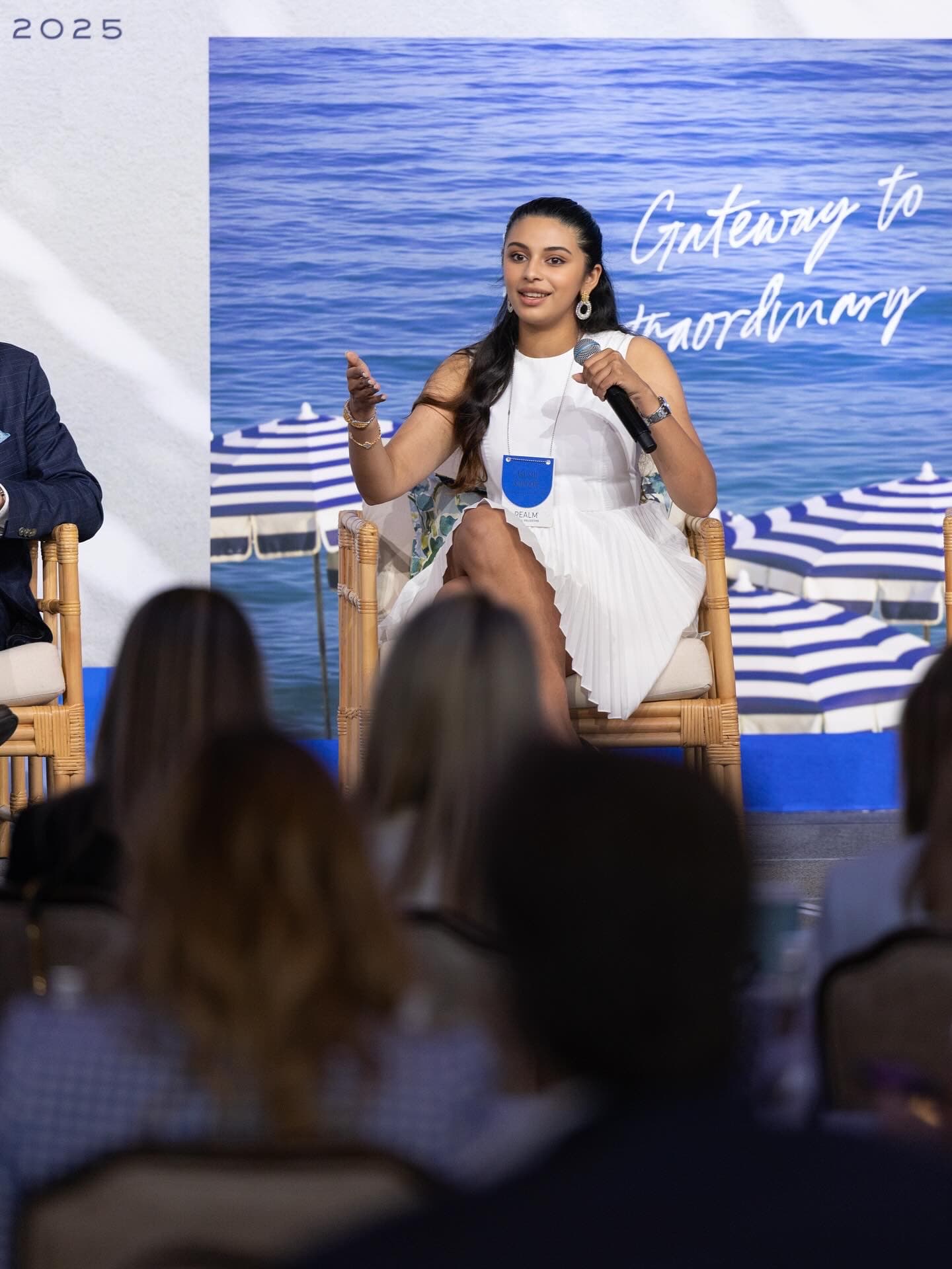 Arushi Kapoor speaking on a conference panel